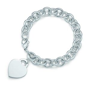 Tiffany & Co. heart tag charm bracelet - engraved
